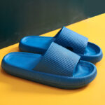 Spot cross-border thick-soled slippers women's summer home sandals and slippers soft bottom EVA home slippers men's feeling of stepping on shit 5001